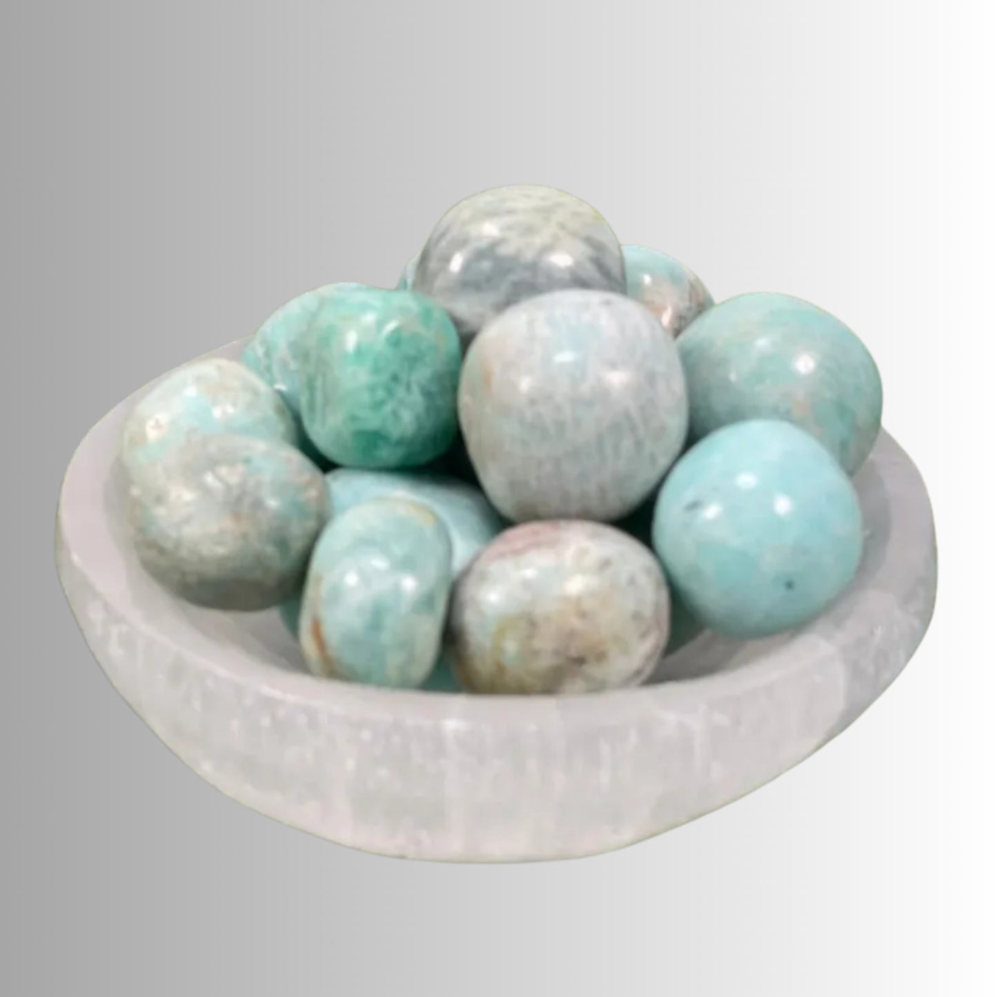 Tumbled Amazonite crystal in aqua green and turquoise hues with natural white veining, used for communication, courage, and emotional healing