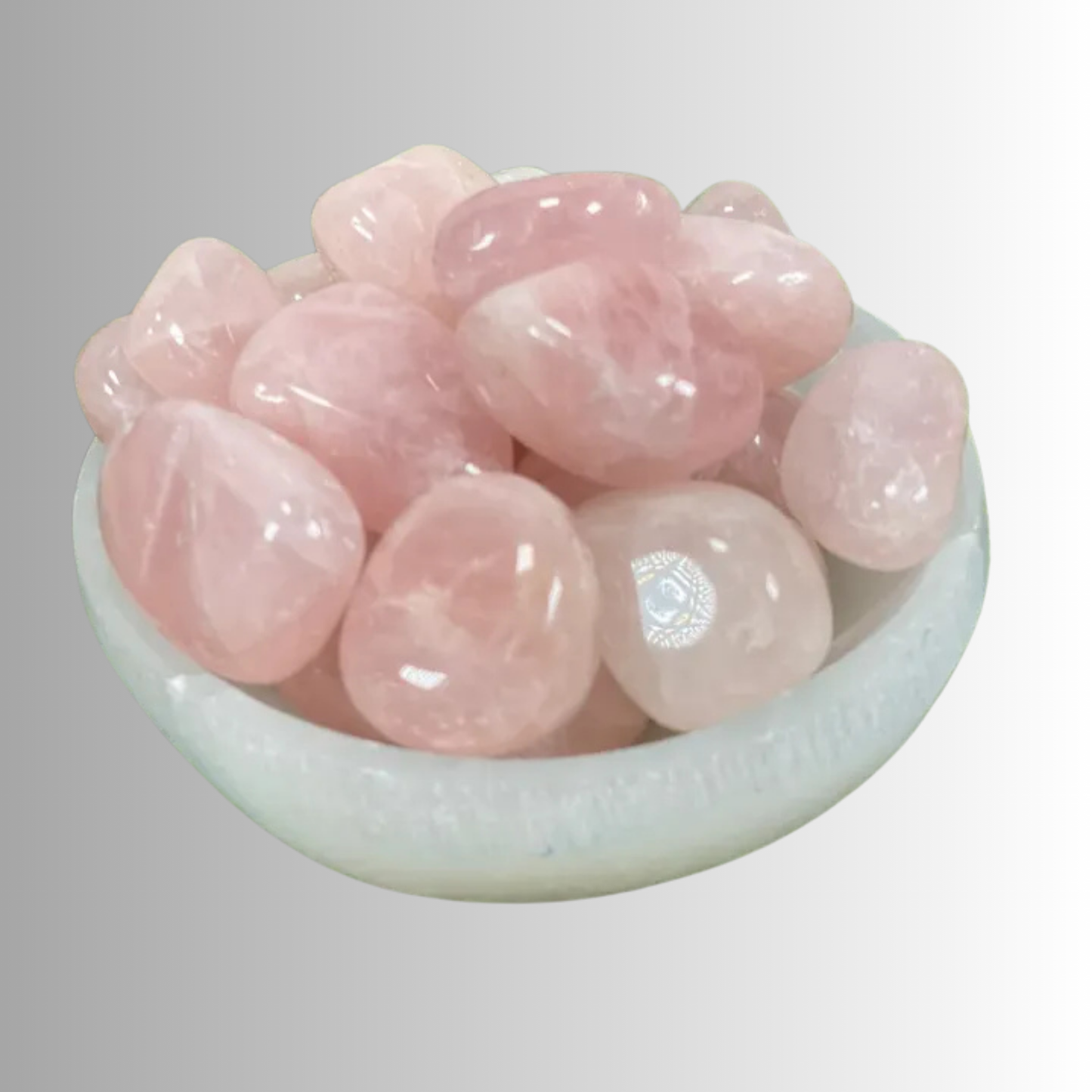 Tumbled Rose Quartz crystal in soft pink hues, used for love, healing, compassion, and emotional balance
