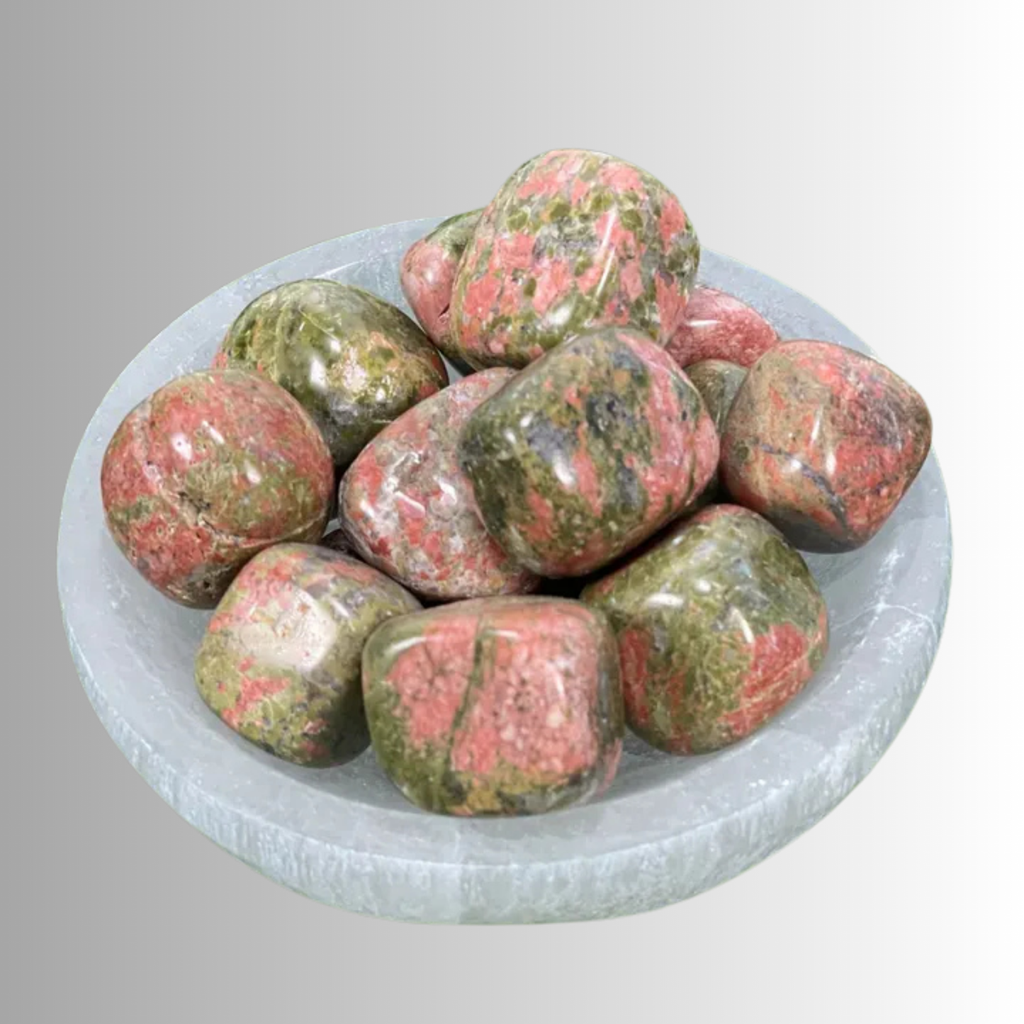Tumbled Unakite crystal in green and pink hues with earthy tones, used for healing, compassion, emotional balance, and grounding