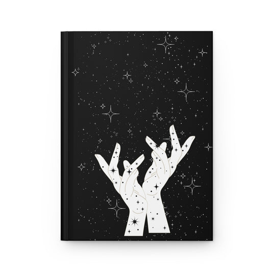 Cover of the Celestial Hands Journal showing cosmic stars, radiant hands, and space for magical writing, dreams, and manifestation