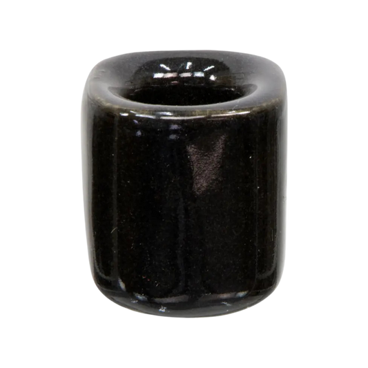 Black ceramic chime candle holder holding a 4-inch chime candle, sleek and sturdy design for safe and elegant candle display