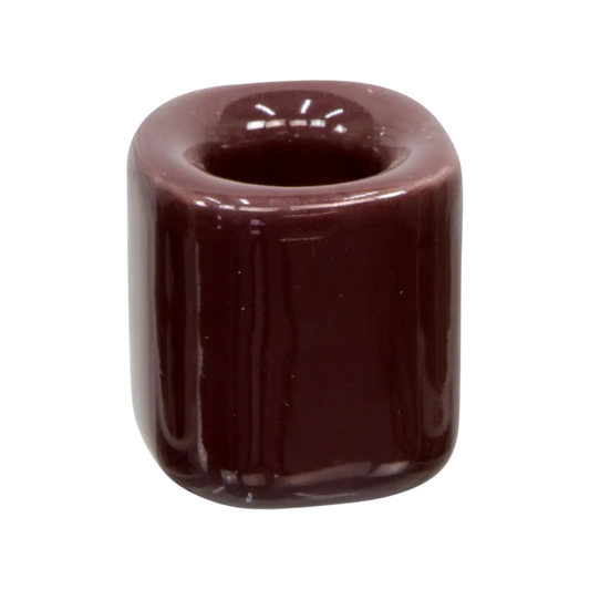 Brown ceramic chime candle holder holding a 4-inch chime candle, sturdy design for safe and elegant display