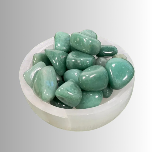 Tumbled Green Aventurine crystal in soft to deep green with subtle shimmer, used for prosperity, luck, growth, and heart healing