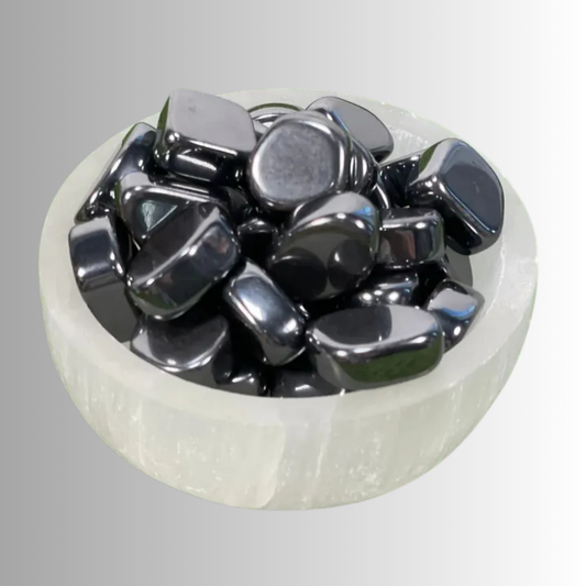 Tumbled Hematite crystal in gunmetal gray to silver-black with metallic sheen, used for grounding, protection, focus, and stability