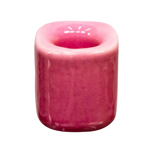 Pink ceramic chime candle holder holding a 4-inch chime candle, elegant and functional design for ritual or decorative use