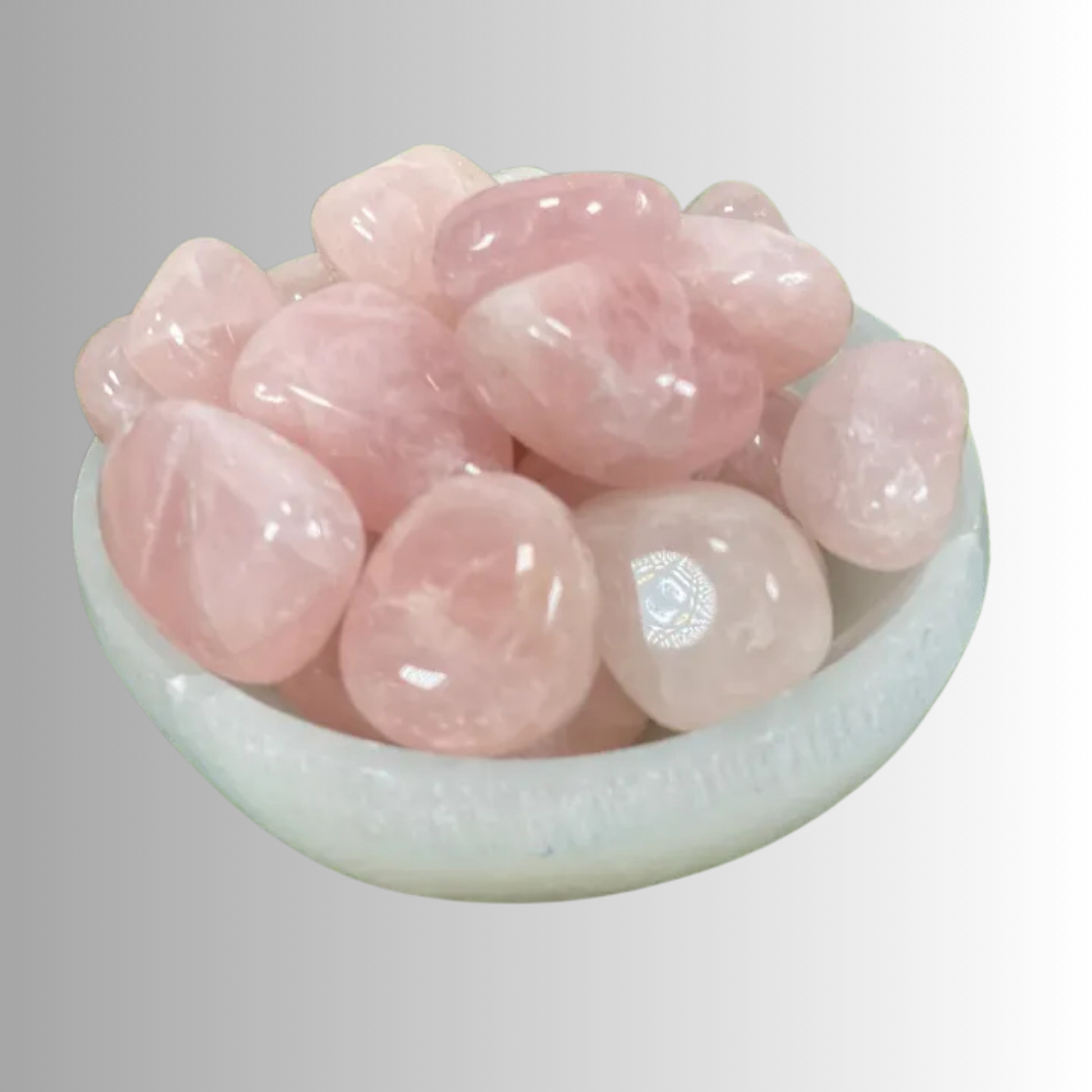 Tumbled Rose Quartz crystal in soft pink hues, used for love, healing, compassion, and emotional balance