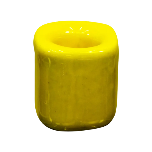 Yellow ceramic chime candle holder holding a 4-inch chime candle, elegant and functional design for ritual or decorative use